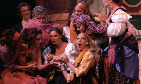 Women on stage performing an opera