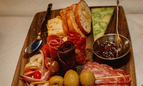 A charcuterie board as presented at La Concina at the Cellar Upstairs, above the San Sebastian Winery