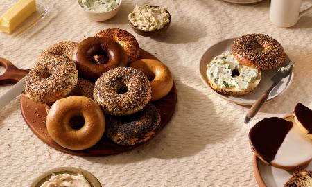Various bagels spread out from H&H