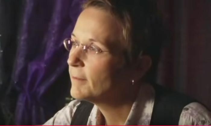 Songwriter Mary Gauthier onstage, smiling